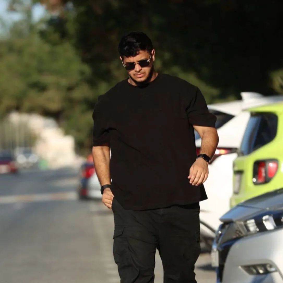 Mr Yousef Tameme walking